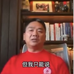 Source image for Serious Man Speaks Before a Bookshelf
